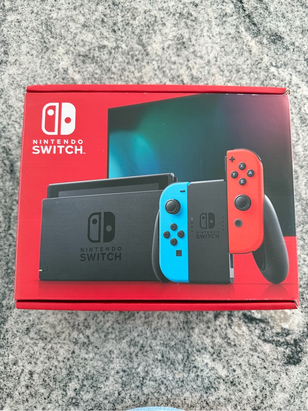 Nintendo Switch with Neon Blue Left and Neon Red Right Joy‑Con